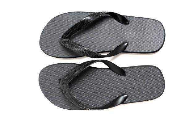 istock Close-up of Black Flip-Flops Isolated on White 1481845231