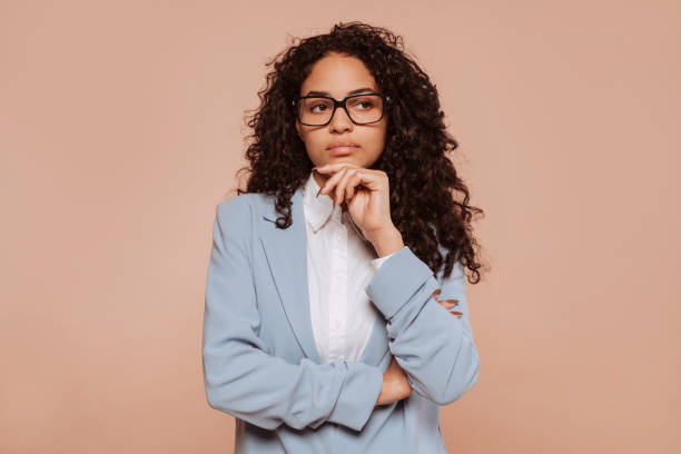 istock Young thoughtful businesswoman looking away 1481847653