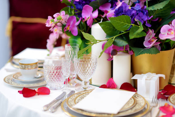 istock Beautiful table setting with crockery and flowers for a party, wedding reception or other festive event 1481847745