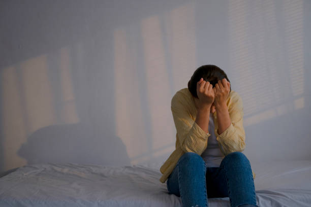 istock Sad woman is crying in bedroom. 1481849246
