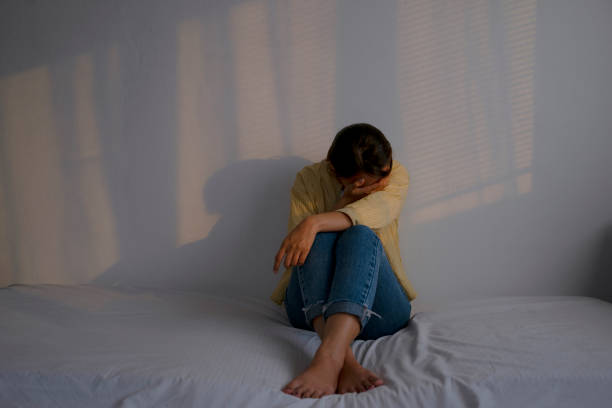 istock Sad woman is crying in bedroom. 1481849377