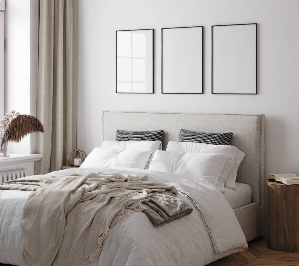 istock Poster frame mockup in white cozy bedroom interior with double bed 1481854401