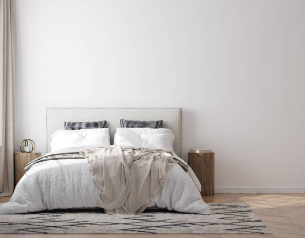 istock Home mockup, white cozy bedroom interior with double bed and white blank wall 1481854402