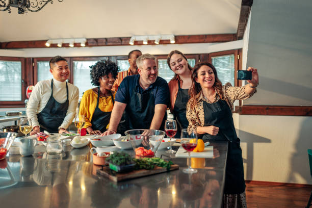 istock Happy friends take selfie in cooking lesson. 1481856767
