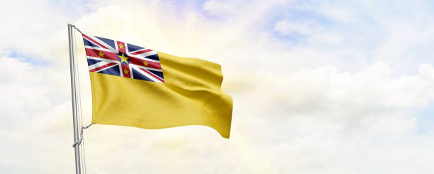 istock Niue flag waving on sky background. 3D Rendering 1481859270