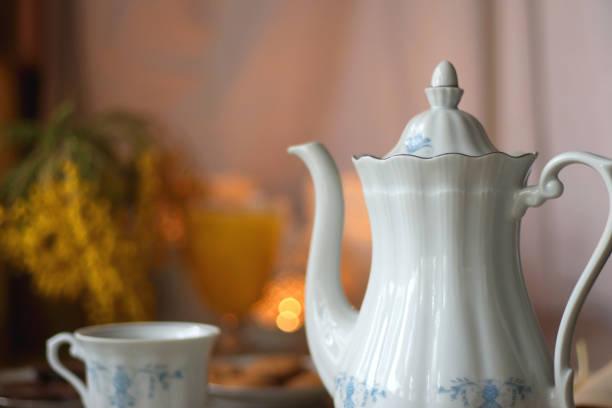 istock Tea, Cookies, Chocolate, Blueberries, Juice, Book and Candles 1481861163