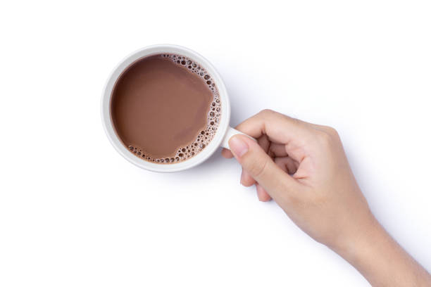 handheldentasse mit heißem schokoladenkakaogetränk - hot chocolate hot drink high section color image stock-fotos und bilder
