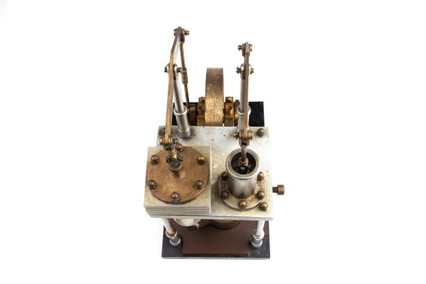 istock closeup of a stirling engine construction isolated on white 1481865604