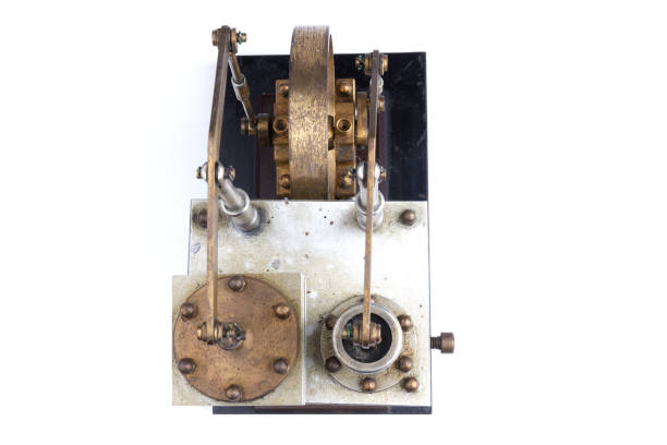 istock closeup of a stirling engine construction isolated on white 1481865605
