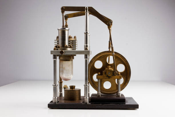 istock closeup of a stirling engine construction isolated on white 1481865623
