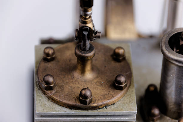 istock closeup of a stirling engine construction isolated on white 1481865667