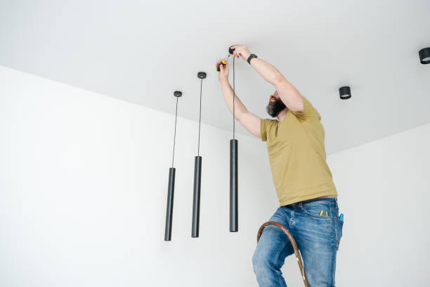 istock An adult man installing ceiling lights in the apartment 1481866301