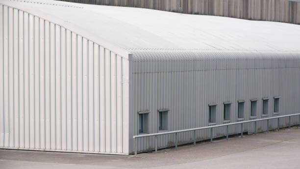 istock Metallic corrugated hangar in industrial area 1481870830