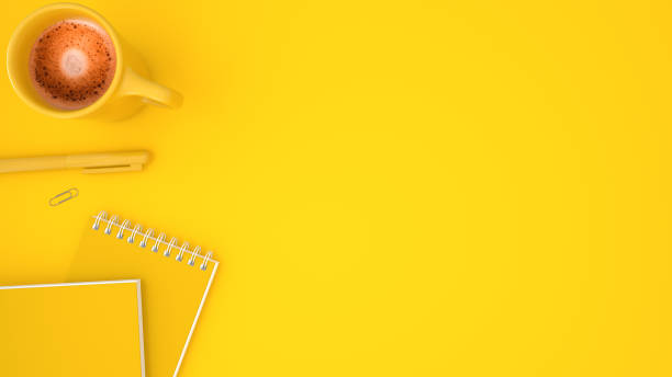 istock Top view, flat lay with copy space. Notepad and coffee cup on yellow background, copy space for text. 3d render. 1481872217