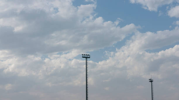 istock Big light towers and cloudy sky 1481872573