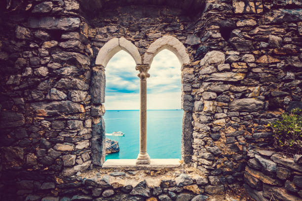 Ancient old window with sea view. Porto Venere, Italy. Liguria