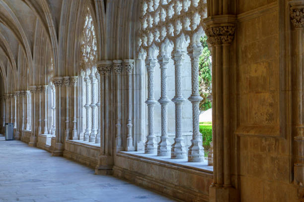 istock monestary corridors with arches and paved walkways Batalha monastery 1481875540