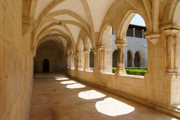istock monestary corridors with arches and paved walkways Batalha monastery 1481876298