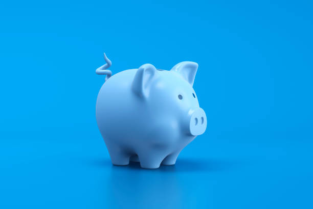 istock Piggy savings concept on blue background 1481883483