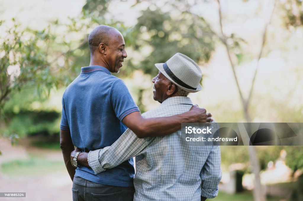 Portrait of an elderly father and adult son Father Stock Photo
