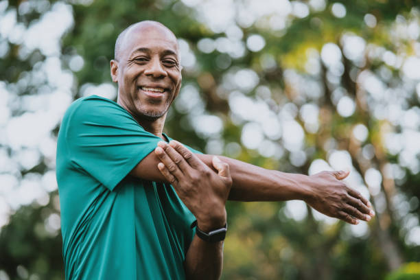 istock Portrait of a man doing exercise stretching and looking at camera 1481886855