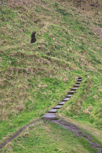 Steps in the steep cliff walk to Kinbane Castle ruins, Ballycastle, UK