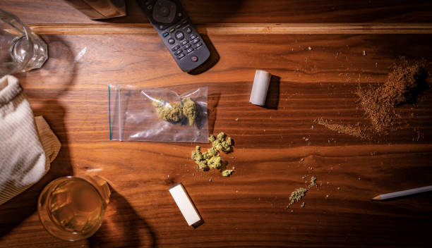 istock Cannabis on a wooden table 1481901988
