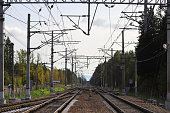 The way forward railway. Train track on green landscape.