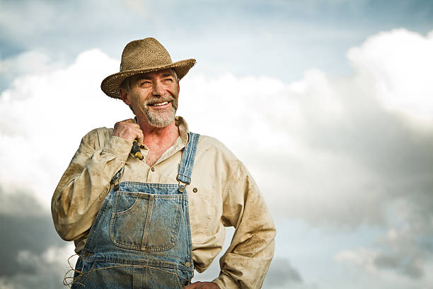 istock 1930s farmer smiling at the Sun 148190502