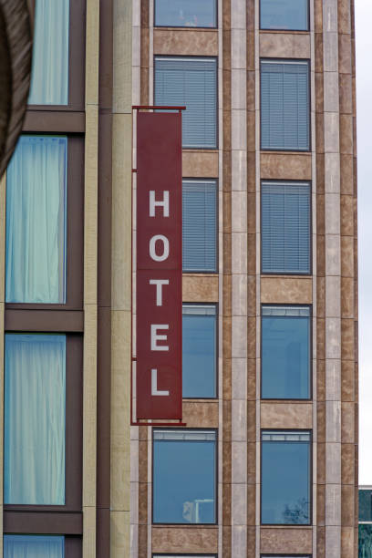 istock Hotel sign with white letters against brown background. 1481910036