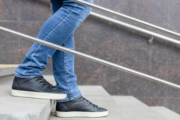 istock close-up shot of a man going down the stairs 1481911724