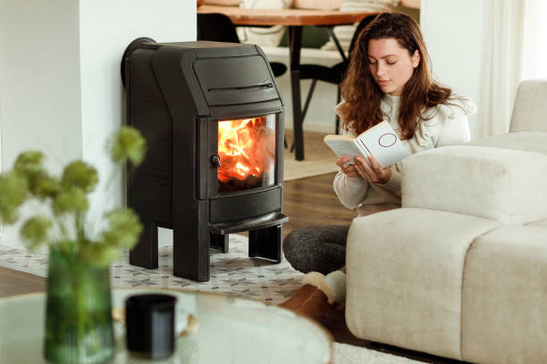 istock Reading books near the fireplace 1481913761