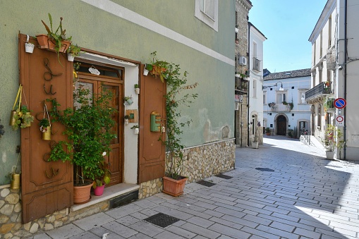 A narrow street among the old houses of Larino, a medieval town in the province of Campobasso.
