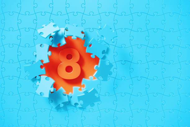 Blue jigsaw puzzle pieces revealing number 8 on orange background. Horizontal composition with copy space. Solution concept.
