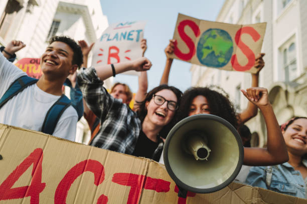 istock Vibrant youth activists marching against climate change 1481918439