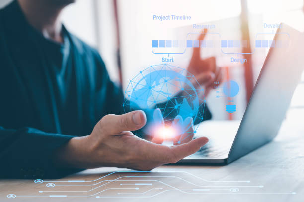 istock strat up business planning concept, man holding virtual glob with connected network and timeline to built new business, business and technology. 1481918527