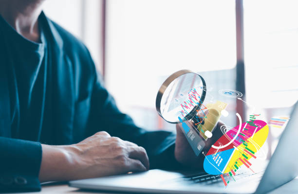 istock man using magnifying glass looking for business strategy to improve customer services and satisfaction, find out how to do best service. 1481920980