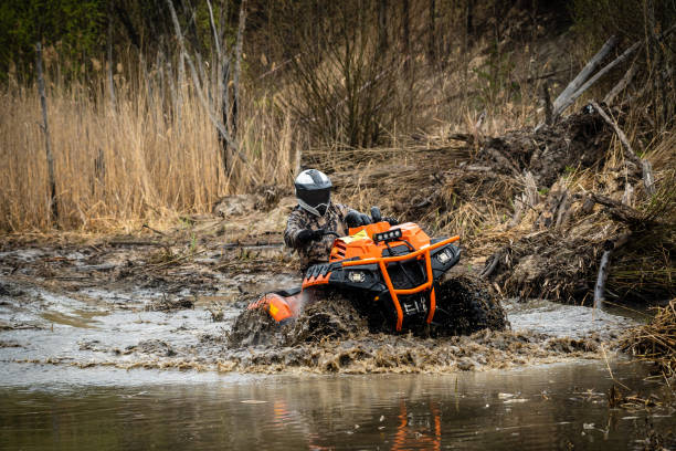 istock ATV/UTV/4x4 driving in muddy water 1481925335