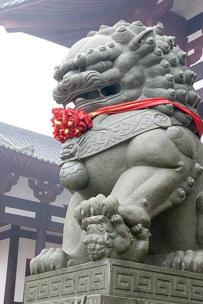 istock fengshui lion with red ribbon 148192619