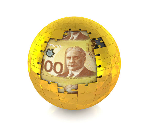 dollars canadiens avec puzzle - puzzle part of gold jigsaw piece photos et images de collection