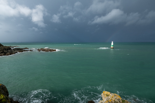 The cloudy front advances over the Breton cliffsWild landscape of the Breton coast