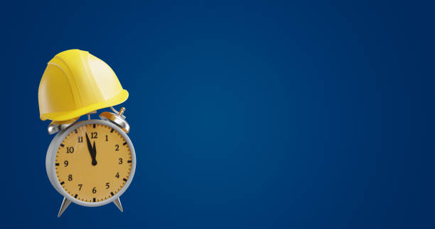 istock Happy Labor Day banner. Protective helmet on the alarm clock. 3d rendering 1481932099