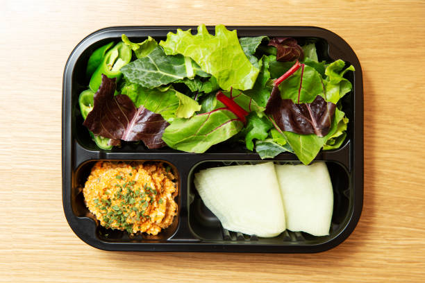 istock Vegetable salad and side dishes in a lunch box 1481934373