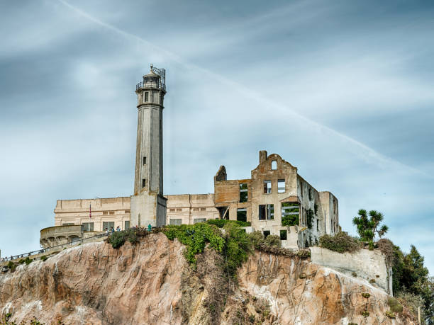 A tall guard tower stands watch over the penitentiary on the hill at the Alcatraz Federal Penitentiary.