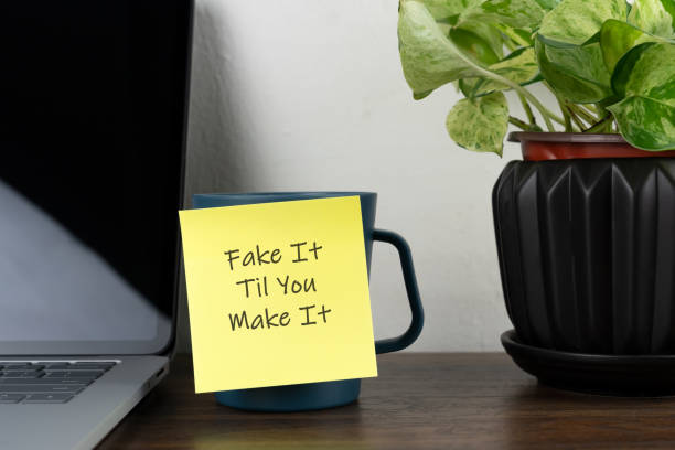istock Adhesive note with text fake it till you make it 1481958855