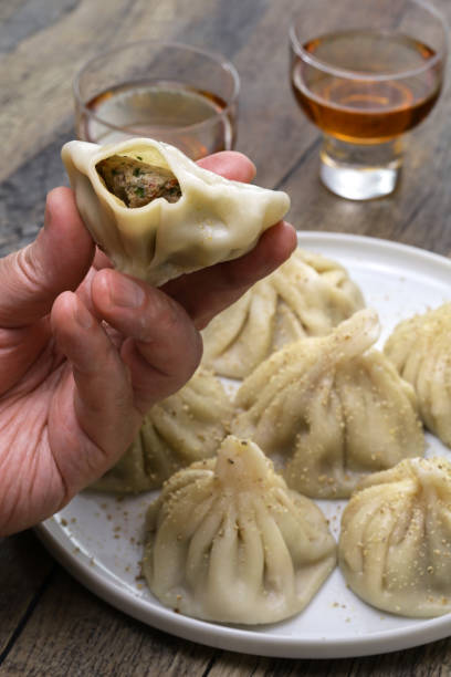 istock how to eat Georgian khinkali dumplings 1481962534