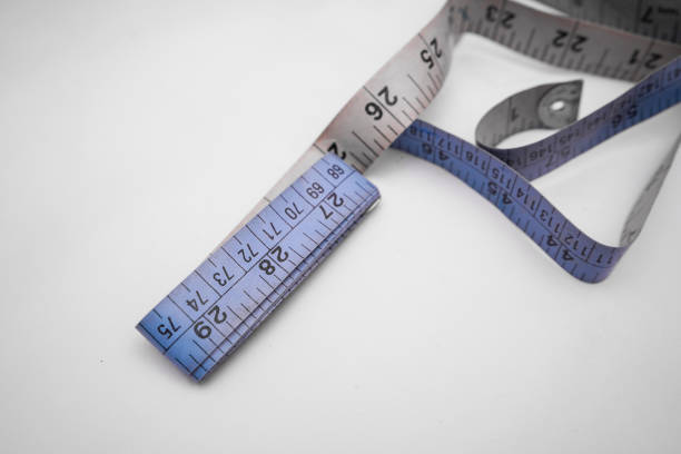 Blue measuring tape isolated on white background