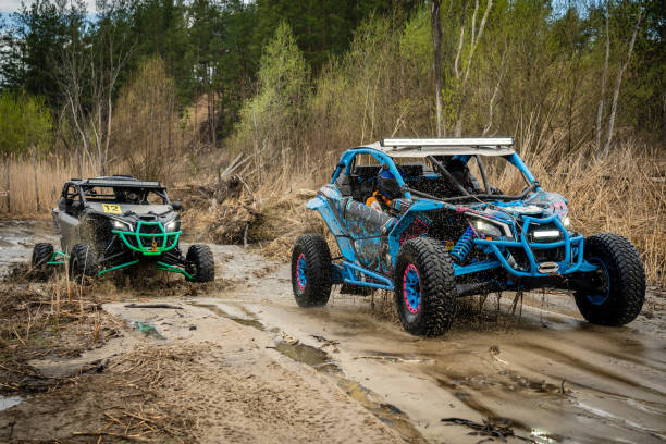 istock Atv vehicles in muddy water at the quad (buggy) competition 1481972637
