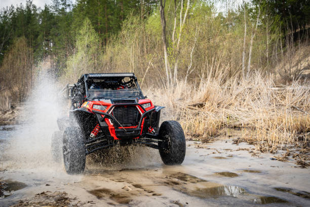 istock Cool view on hard ride UTV in muddy water 1481972654
