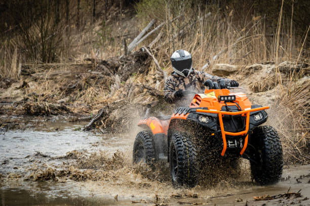istock ATV/UTV/4x4 driving in muddy water 1481972666